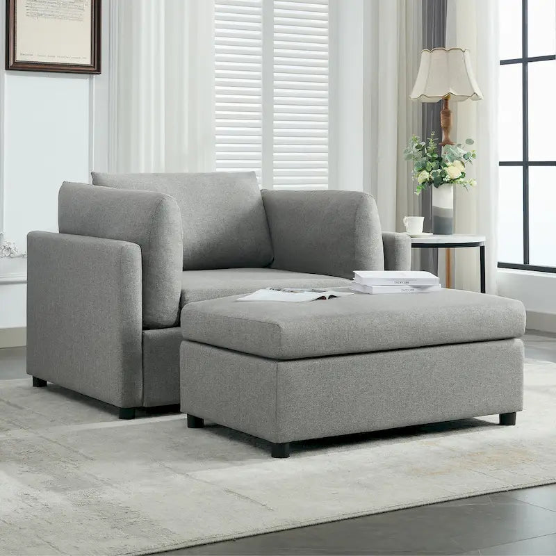 Sillón moderno grande con otomana