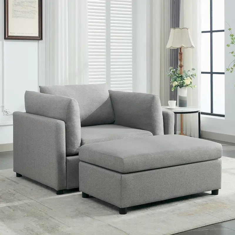 Sillón moderno grande con otomana