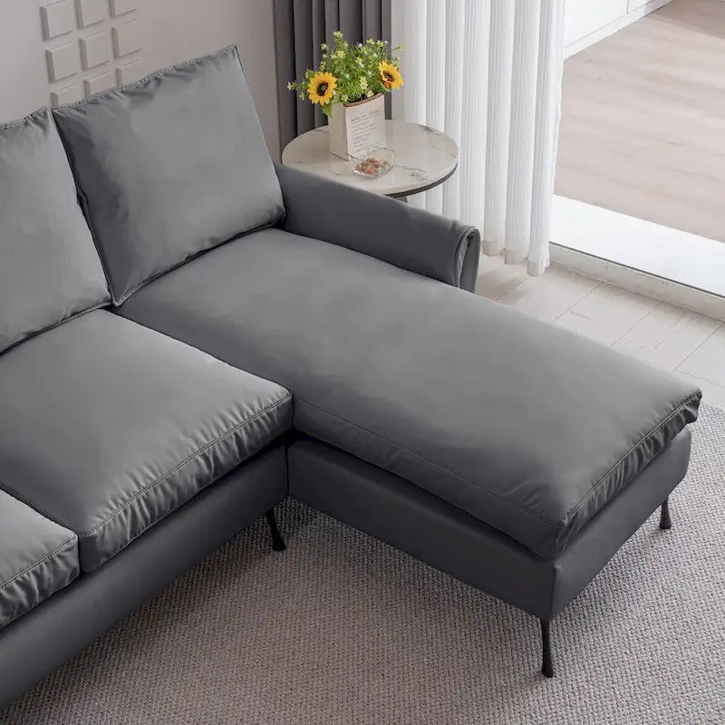 Sofá moderno en forma de L de piel sintética con chaise longue reversible
